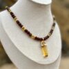 Yellow Crystal Pendant on Amber Glass Necklace
